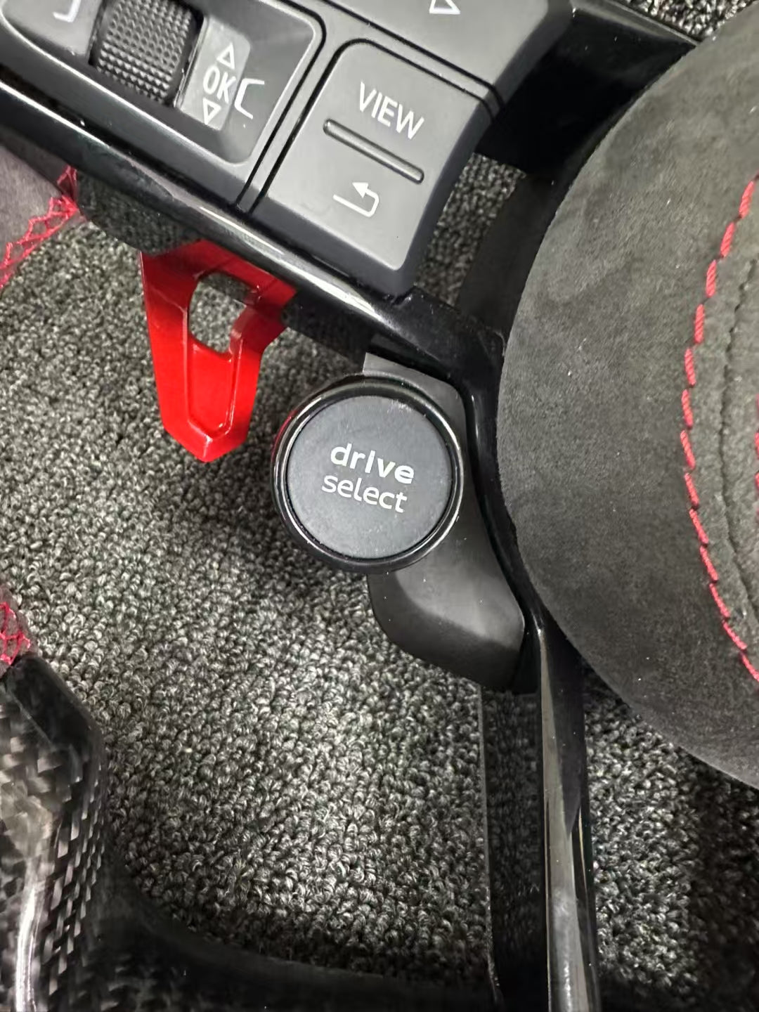 Carbon fiber sports steering wheel - red paddle shifters + Alcantara grips + Alcantara airbag cover + dual-function knob