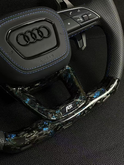 Customized Audi steering wheel forged with carbon, LED, and carbon paddles