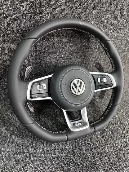 The all-new Volkswagen R line features a flat bottomed sport multifunction steering wheel with multifunctional buttons and carbon fiber paddles