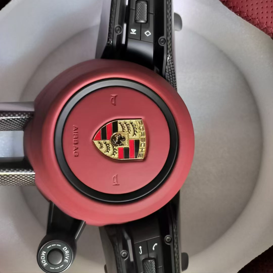 Black and red leather dual piece Porsche steering wheel with knob