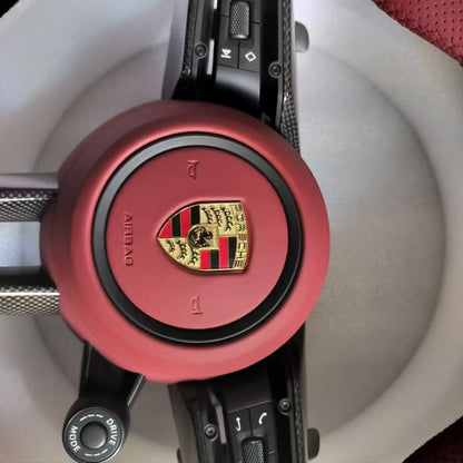 Black and red leather dual piece Porsche steering wheel with knob